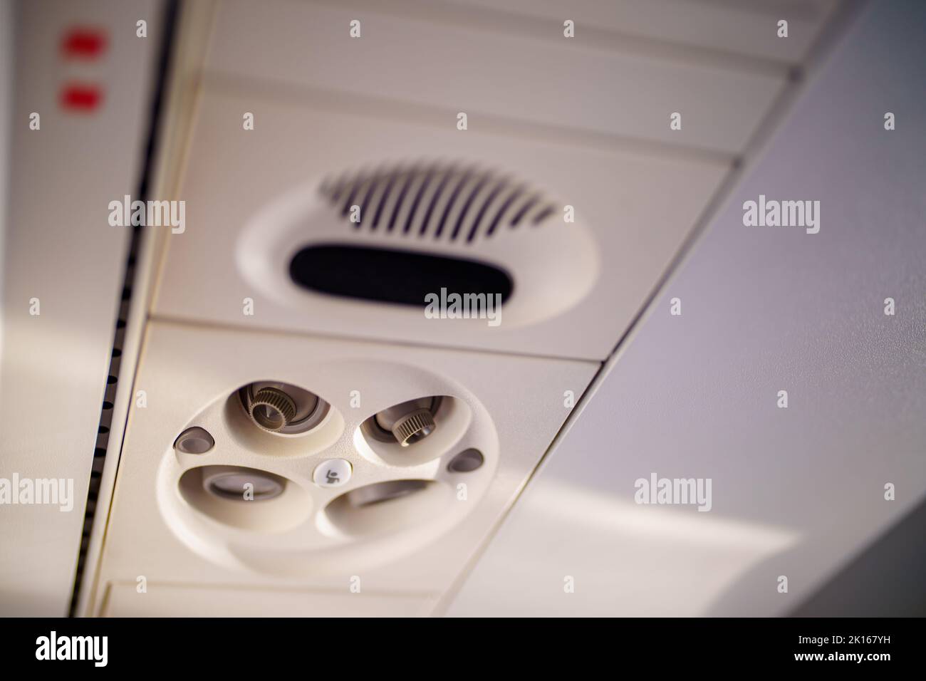 Photo of an airplane air conditioning vent with turn to open feature Stock Photo Alamy
