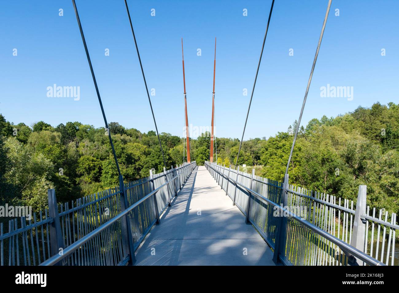 Suspended pedestrian bridge in Milne Dam Conservation Park, Markham, Ontario, Canada Stock Photo