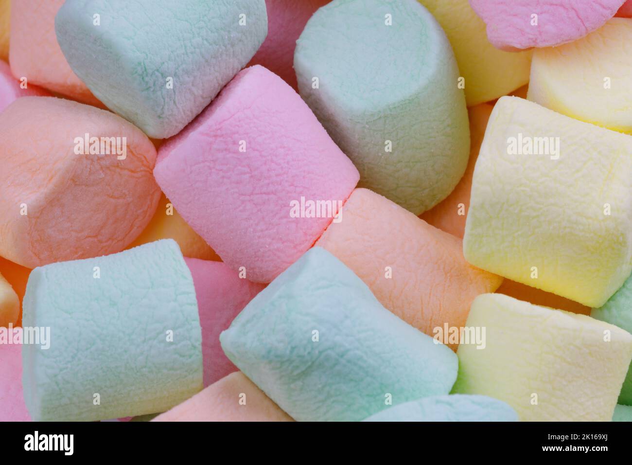 Close up background of some colorful pastal marshmallows Stock Photo