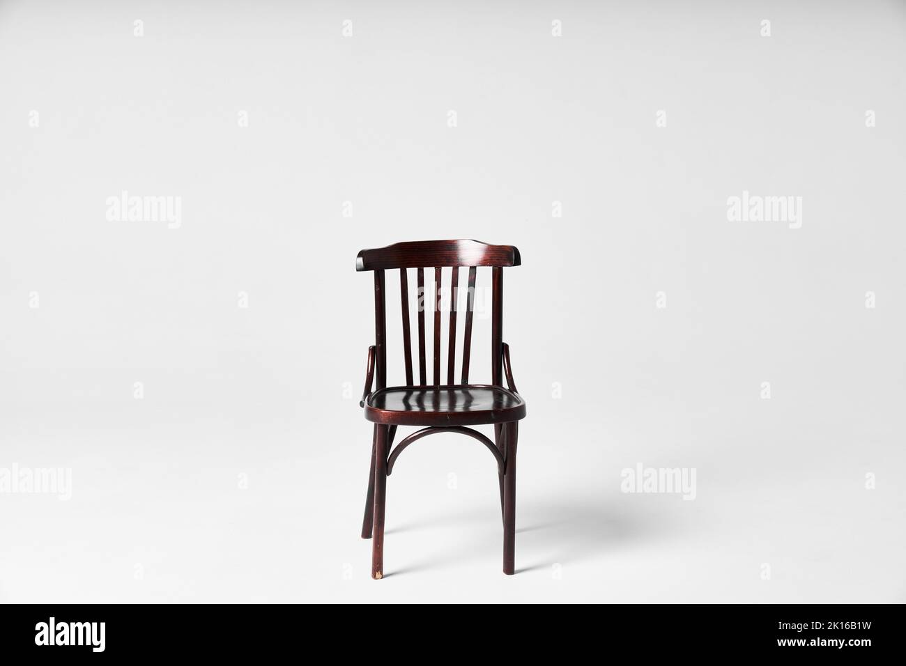 Dark chair on cyclorama under flash light Stock Photo