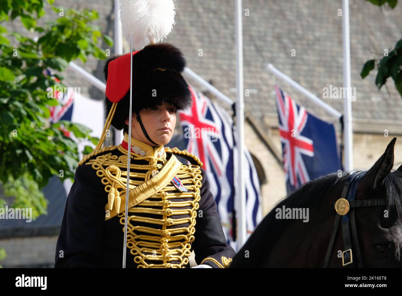A mounted guard rides along Parliament Square after performing in the Queen's coffin procession