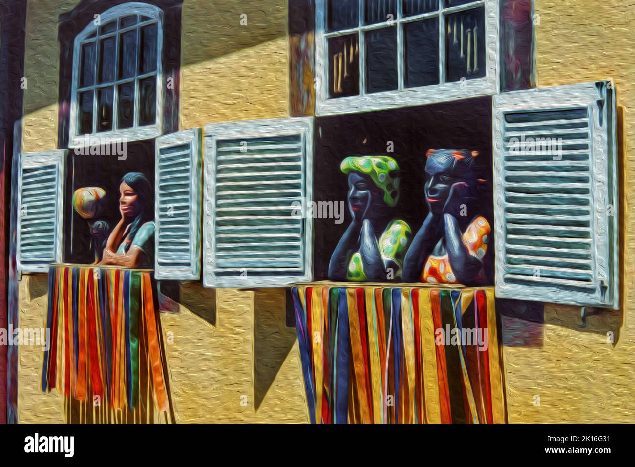 Windows with typical clay busts in the shape of women, in Ouro Preto. A ...