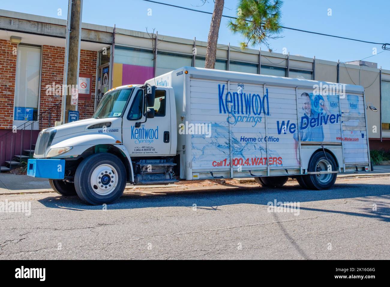 NEW ORLEANS, LA, USA - SEPTEMBER 14, 2022: Full side view of Kentwood Spring Water delivery truck on Prytania Street Stock Photo