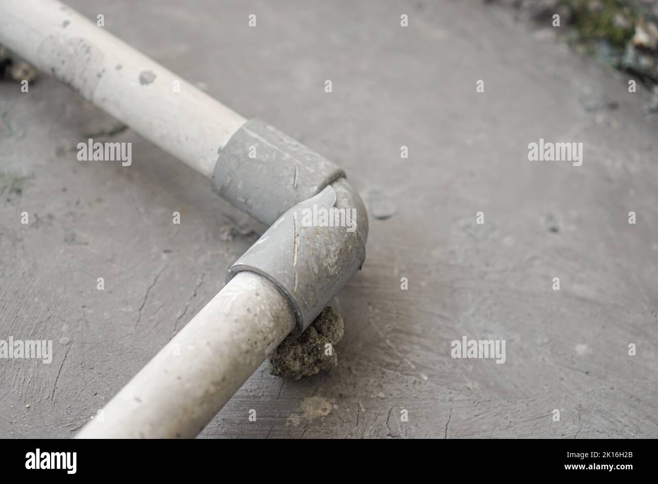 white water pipes connected using Lshaped pipe joints Stock Photo Alamy