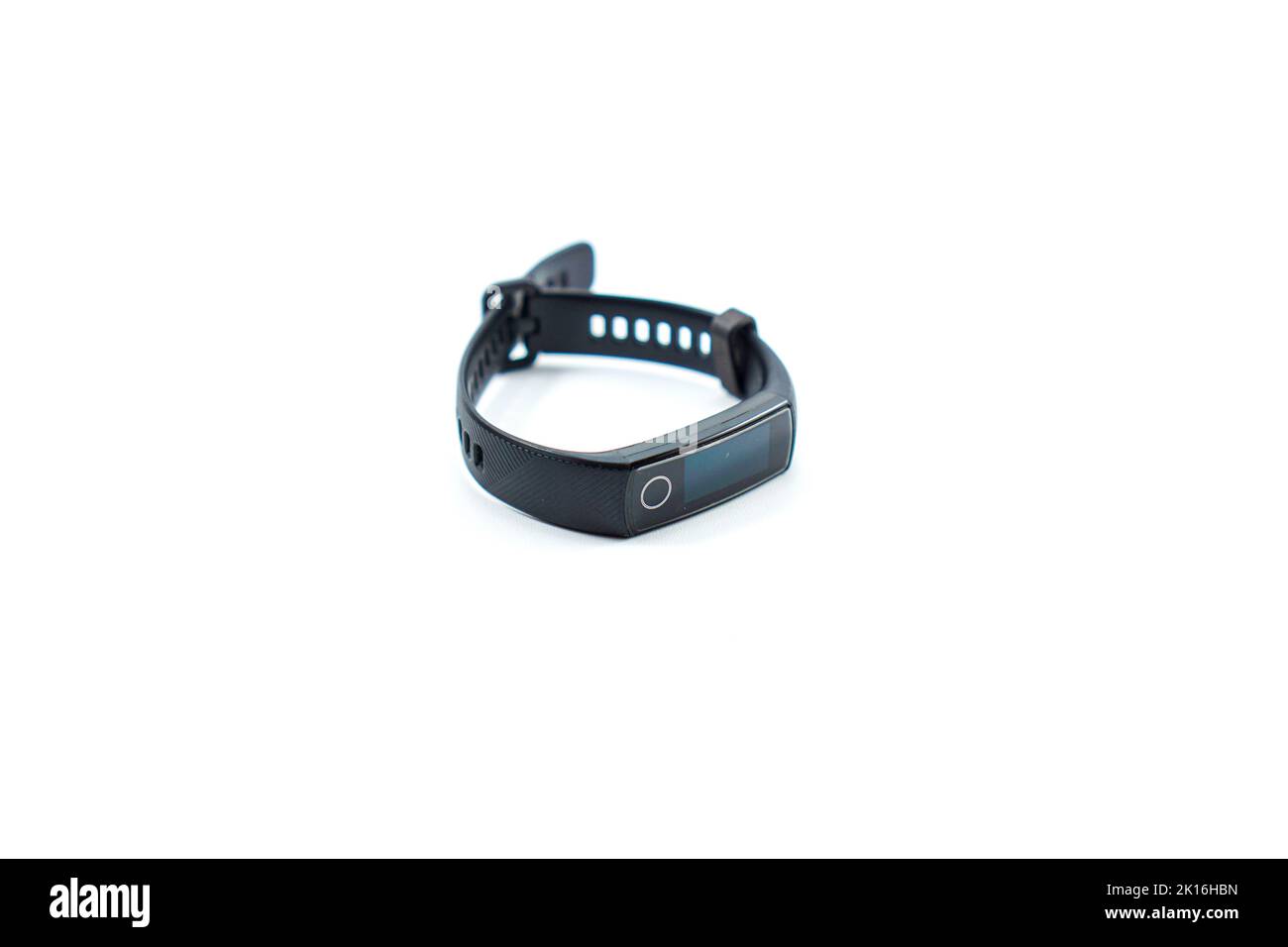 black digital smart fitness watch bracelet with touch screen isolated on a white background