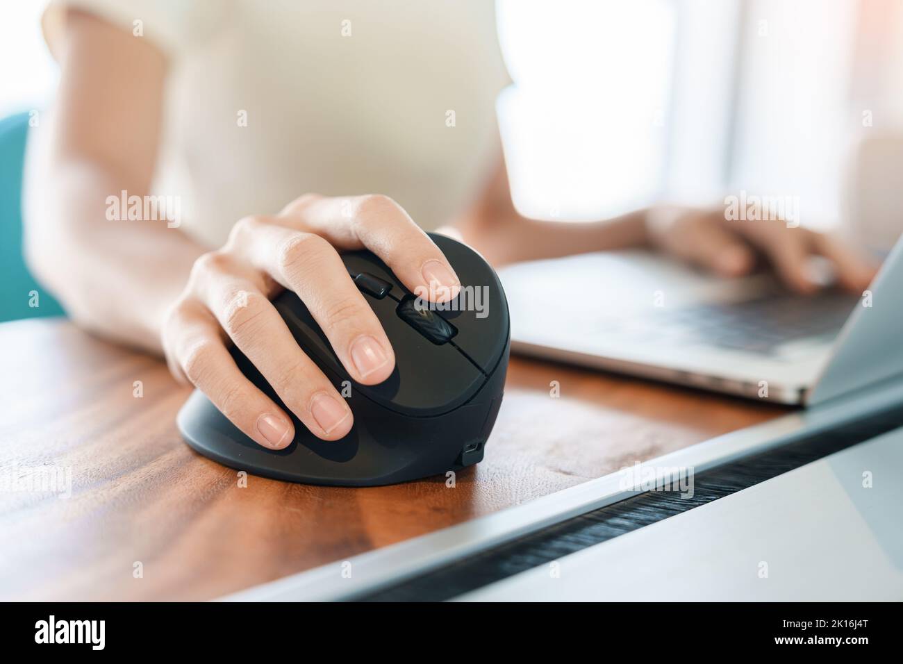woman hand using computer ergonomic mouse, prevention wrist pain