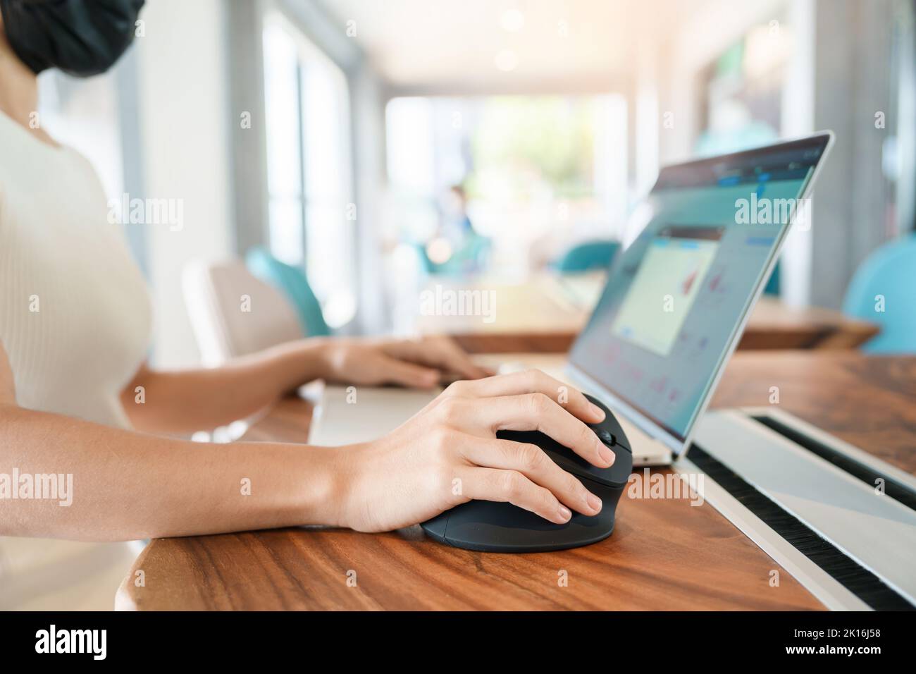 woman hand using computer ergonomic mouse, prevention wrist pain