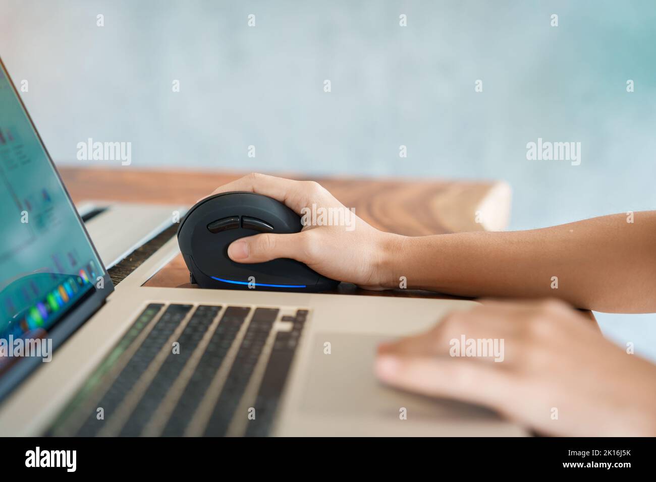 woman hand using computer ergonomic mouse, prevention wrist pain
