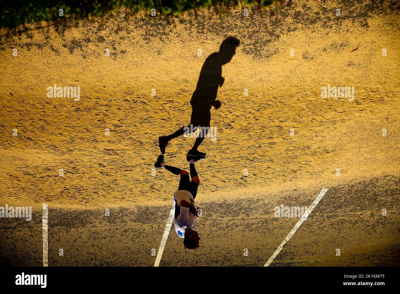silhouette-woman-running-on-beach-hi-res-stock-photography-and-images