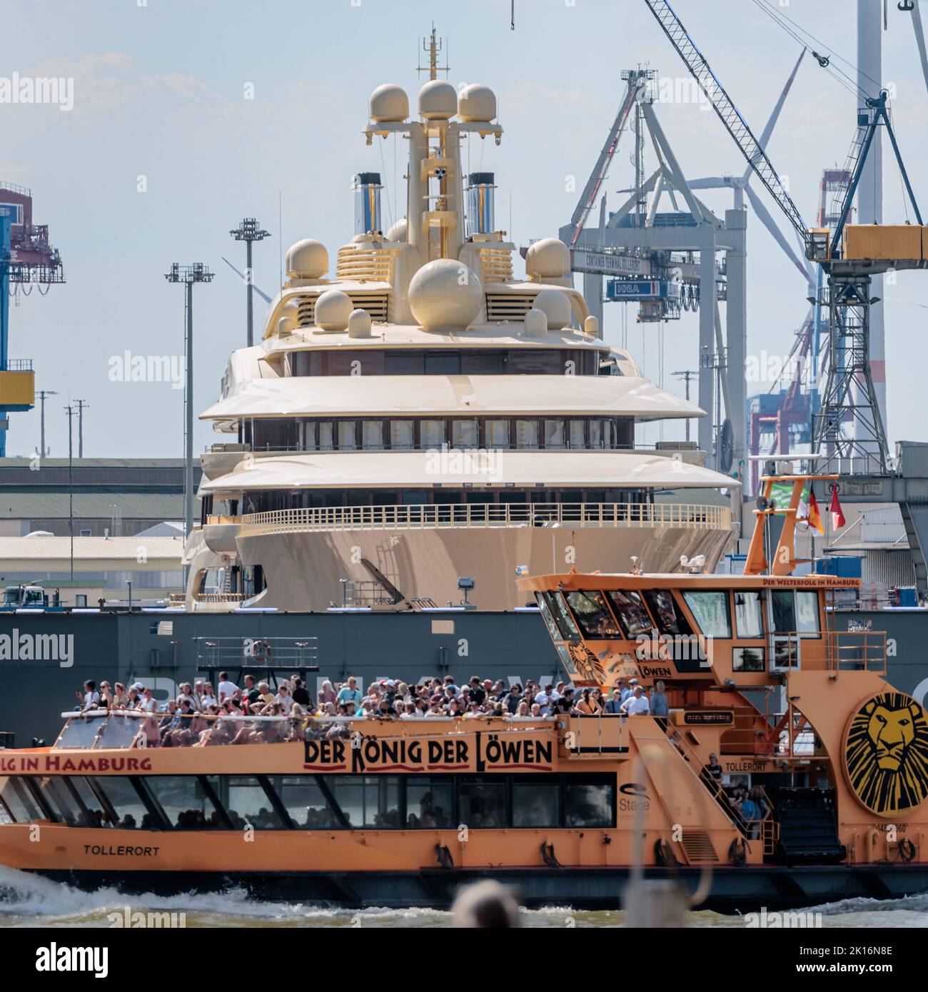 Hamburg, Germany. 23rd Aug, 2022. The mega-yacht 'Dilbar' is moored at Blohm Voss Dock Elbe 17 in the Port of Hamburg. The ship, which is around 156 meters long, is said to belong to a Russian oligarch. Credit: Markus Scholz/dpa/Alamy Live News Stock Photo