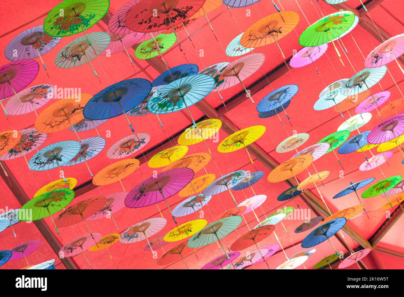 Colorful oilpaper umbrellas hung in the air Stock Photo Alamy