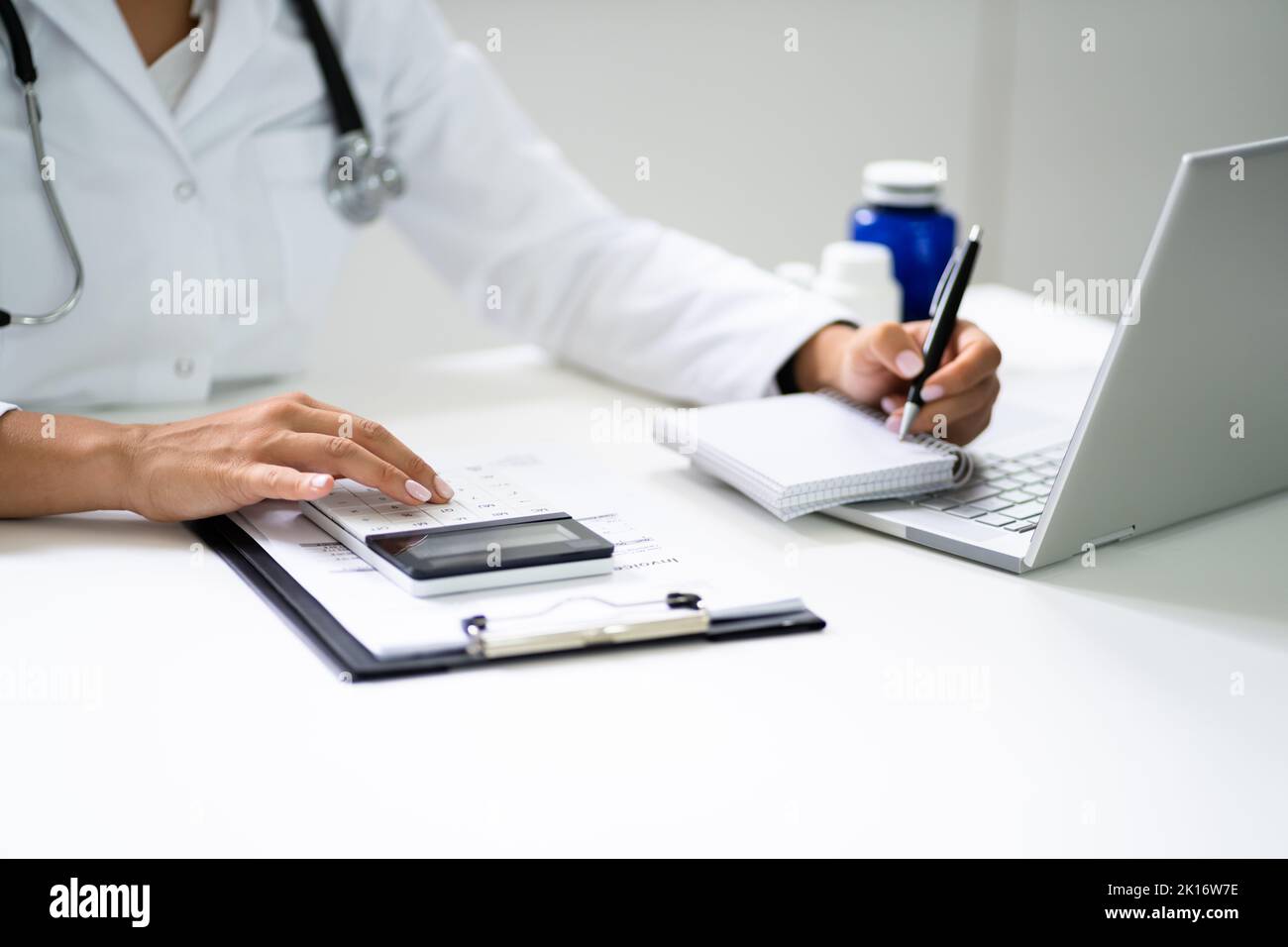 Medical Hospital Bill And Expenses Calculator. Health Money Stock Photo