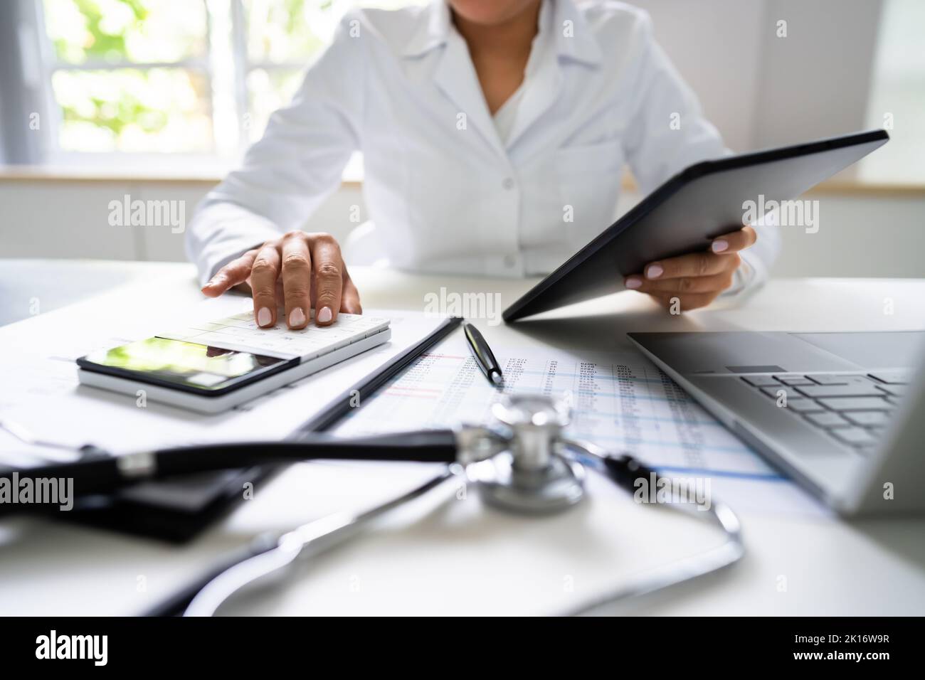 Medical Hospital Bill And Expenses Calculator. Health Money Stock Photo