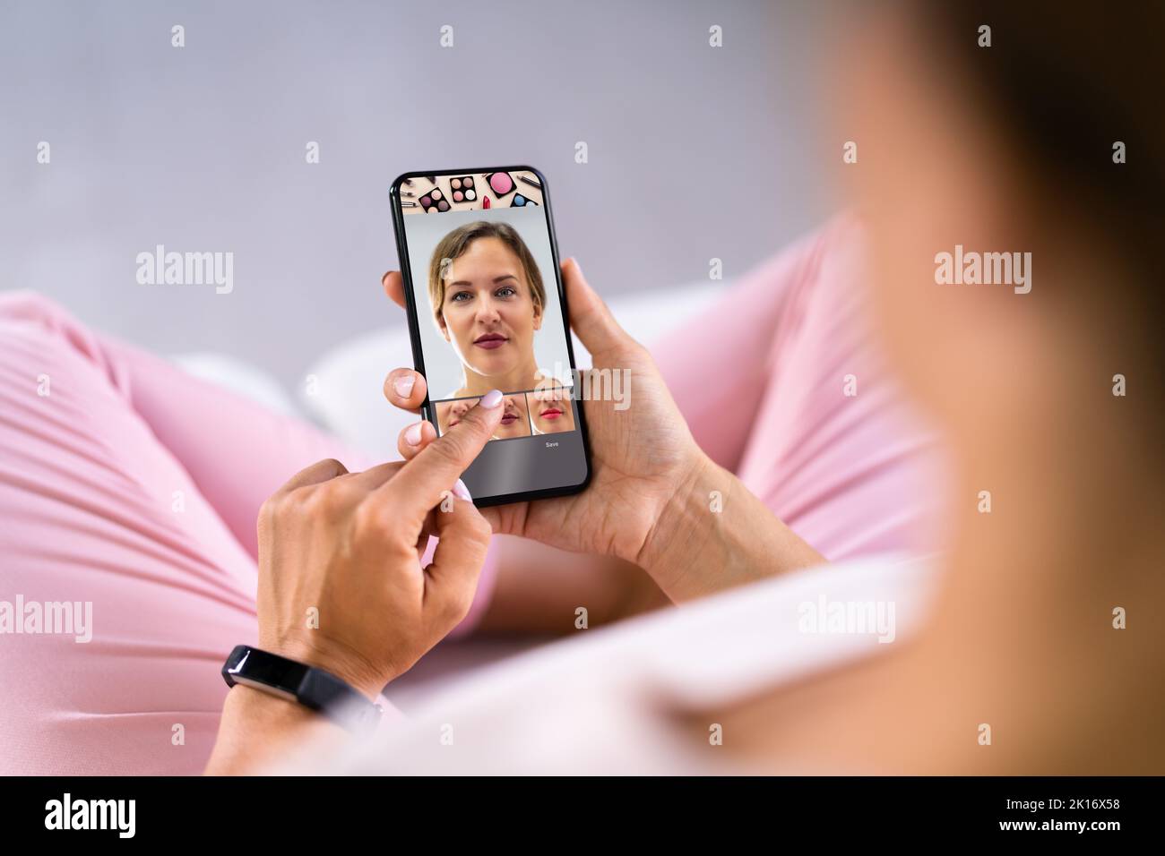 Try Virtual AR Makeup. Woman Using Beauty Digital Technology Stock Photo