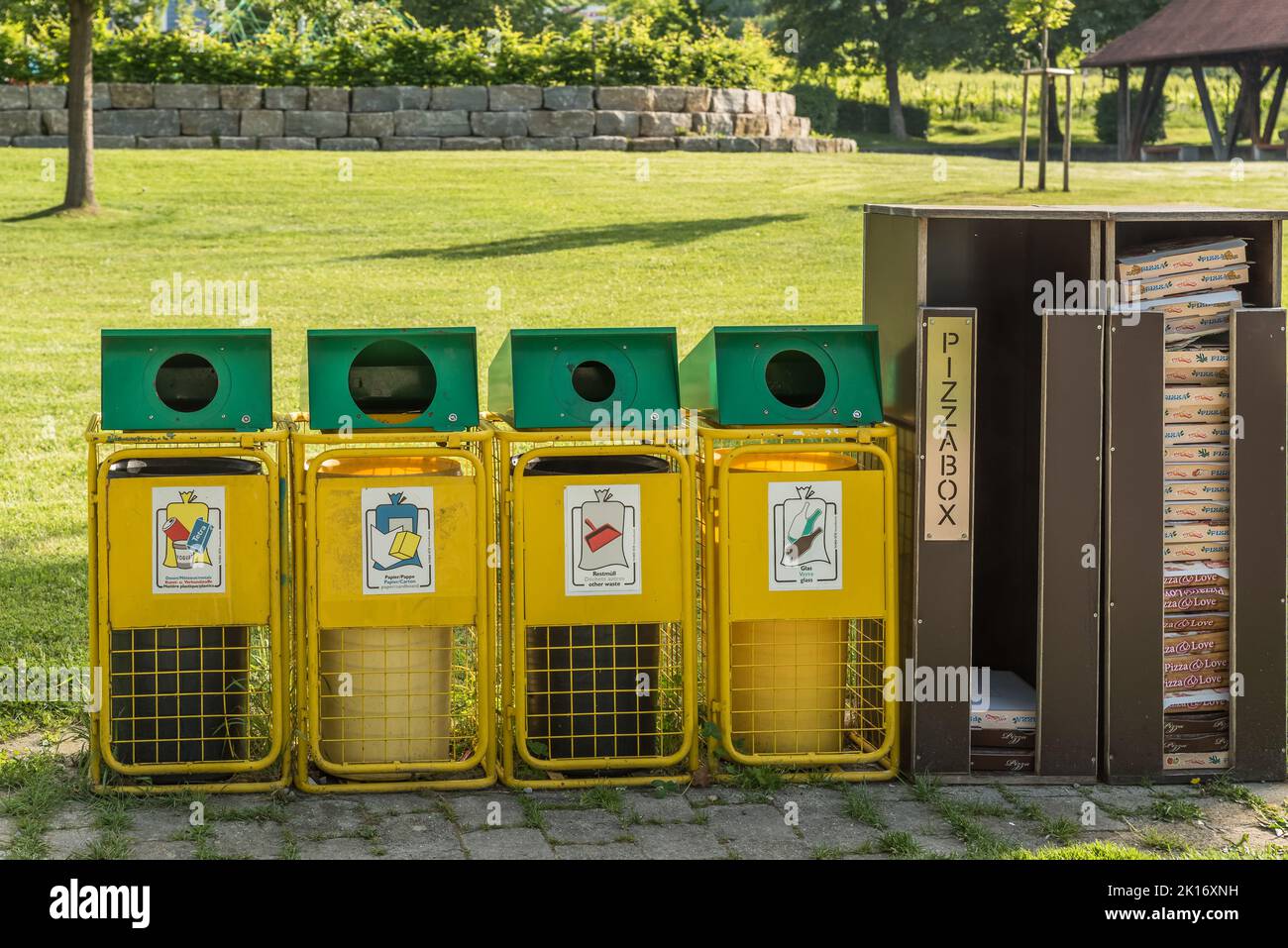 Trash containers in public park for garbage separation Stock Photo