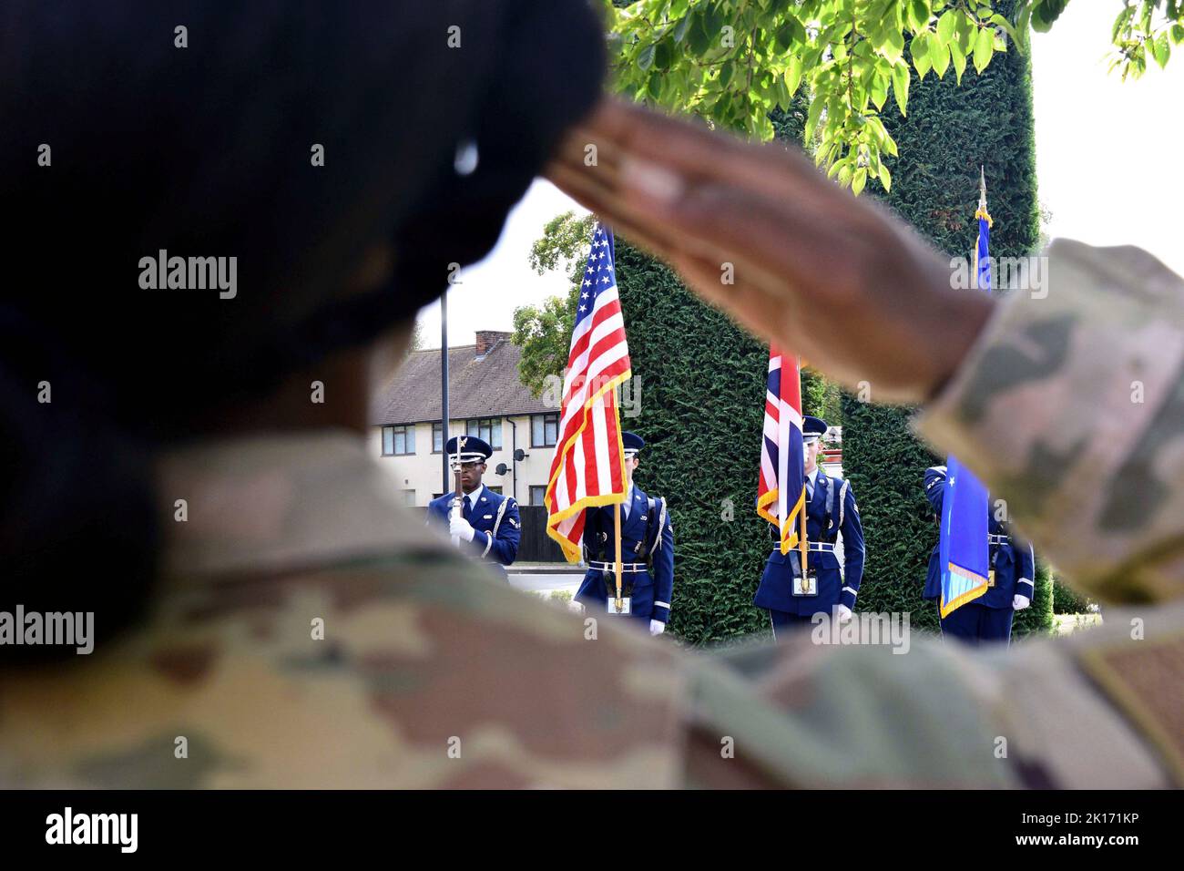 September 11, 2022 - RAF Mildenhall, Suffolk, United Kingdom - U.S. Air Force Chaplain (Capt.) Jennifer Ray, 100th Air Refueling Wing chapel, salutes during the playing of the national anthem at the opening of the 9/11 memorial ceremony on Royal Air Force Mildenhall, England, Septembert. 11, 2022. Airmen, civilians and family members from RAF Lakenheath and RAF Feltwell joined Team Mildenhall in remembrance of the lives lost 21 years ago. (Credit Image: © U.S. Air Force/ZUMA Press Wire Service/ZUMAPRESS.com) Stock Photo