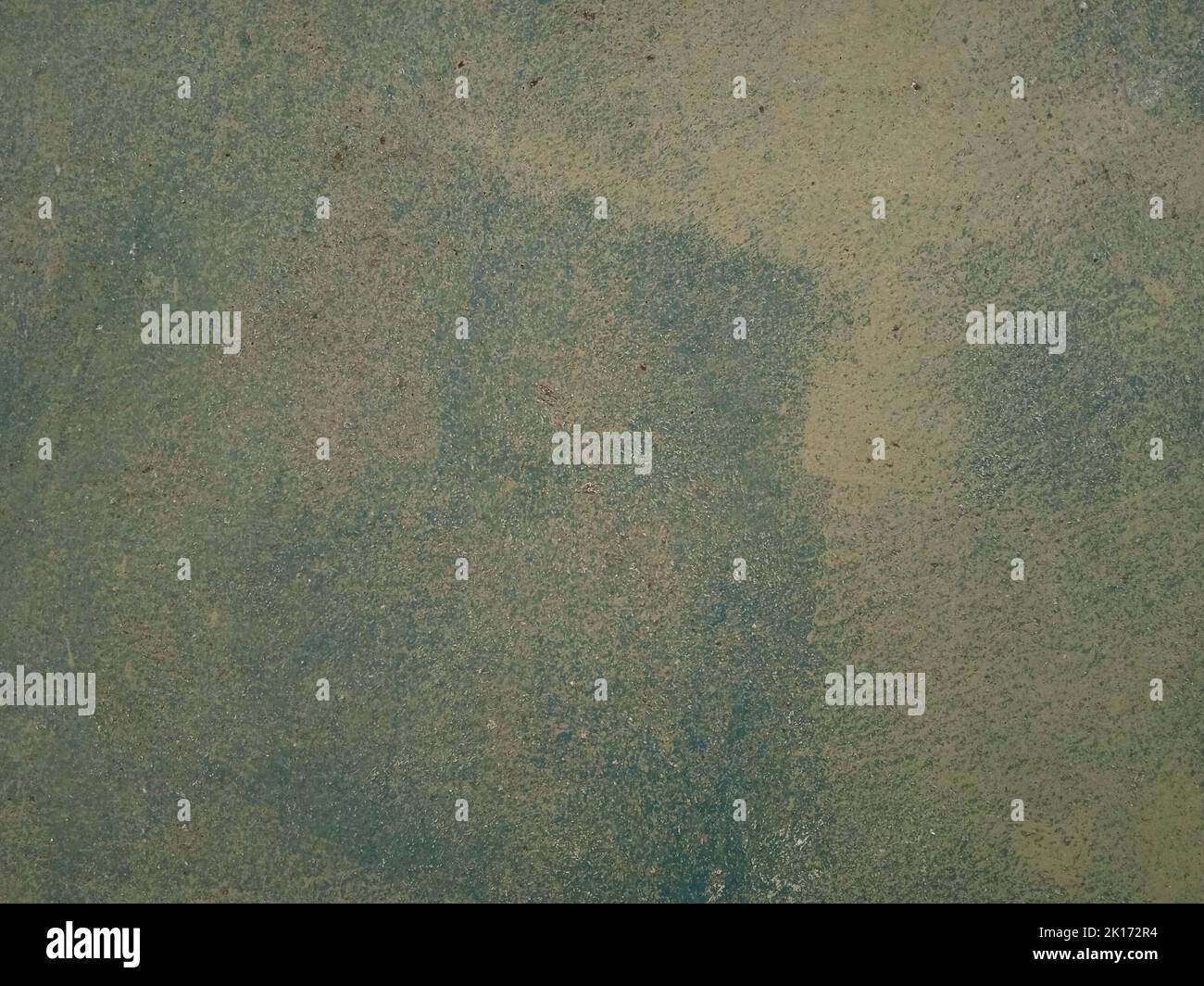 Old dark green texture wall, grunge scratched cracked background. High