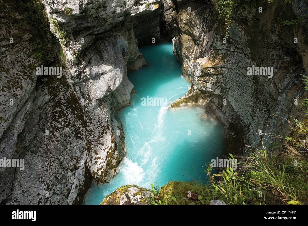 Turquoise water in the mountain gorge Stock Photo