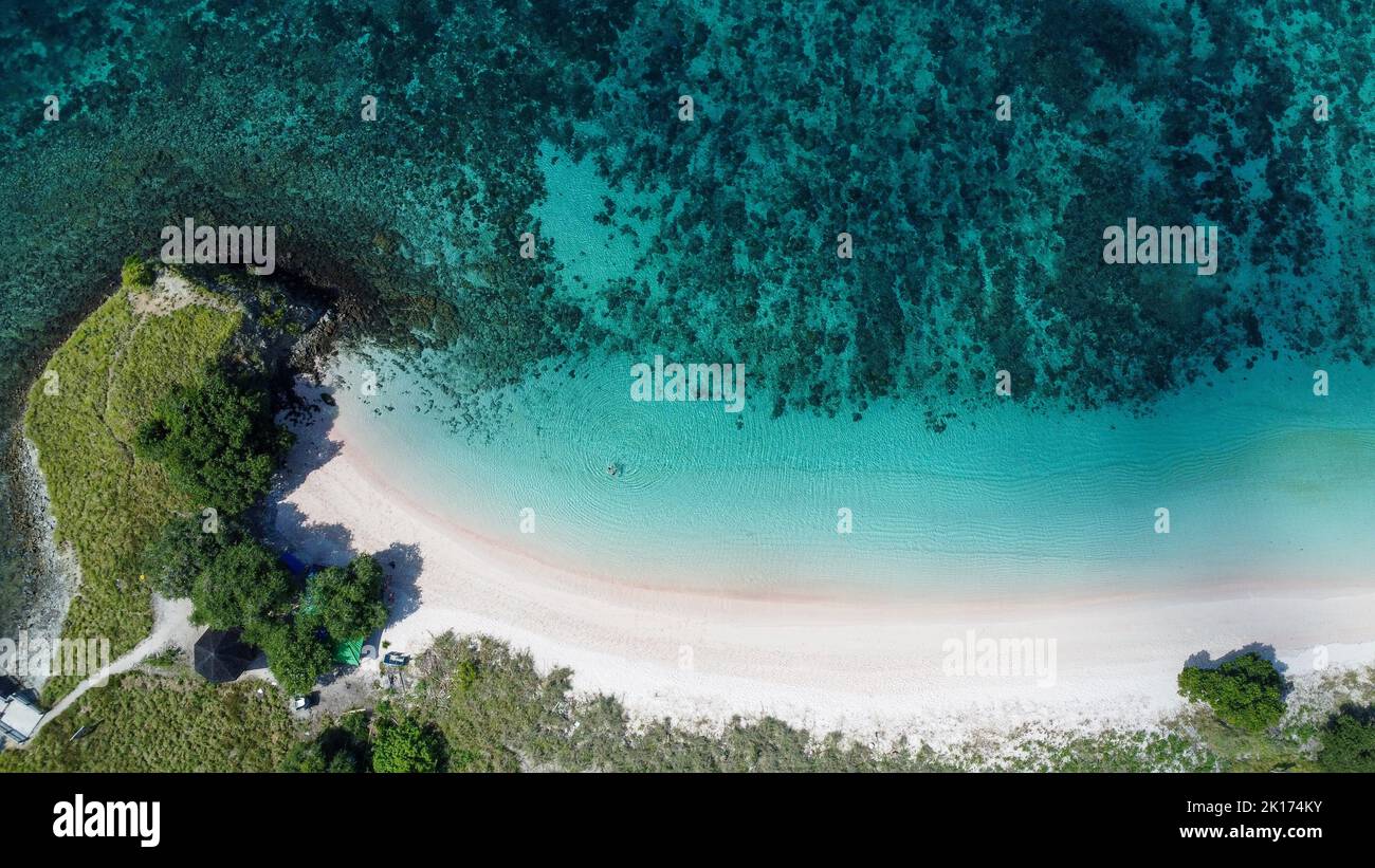 A breathtaking drone view of Pink Beach just off the Komodo Islands in