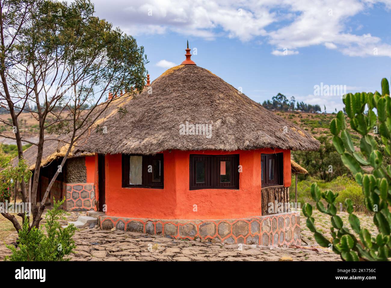 Beautiful colored traditional ethiopian house, hut situated in mountain landscape near Debre