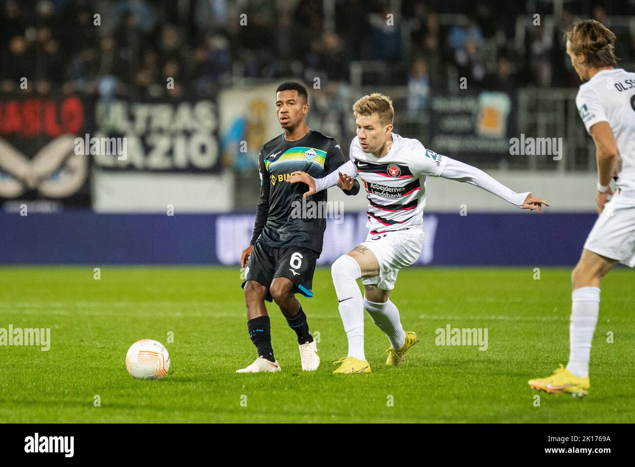 Herning, Denmark. 15th Sep, 2022. Marcos Antonio (6) of Lazio and Charles of FC Midtjylland seen during the UEFA Europa League match between FC Midtjylland and Lazio at MCH Arena in Herning. (Photo Credit: Gonzales Photo/Alamy Live News Stock Photo