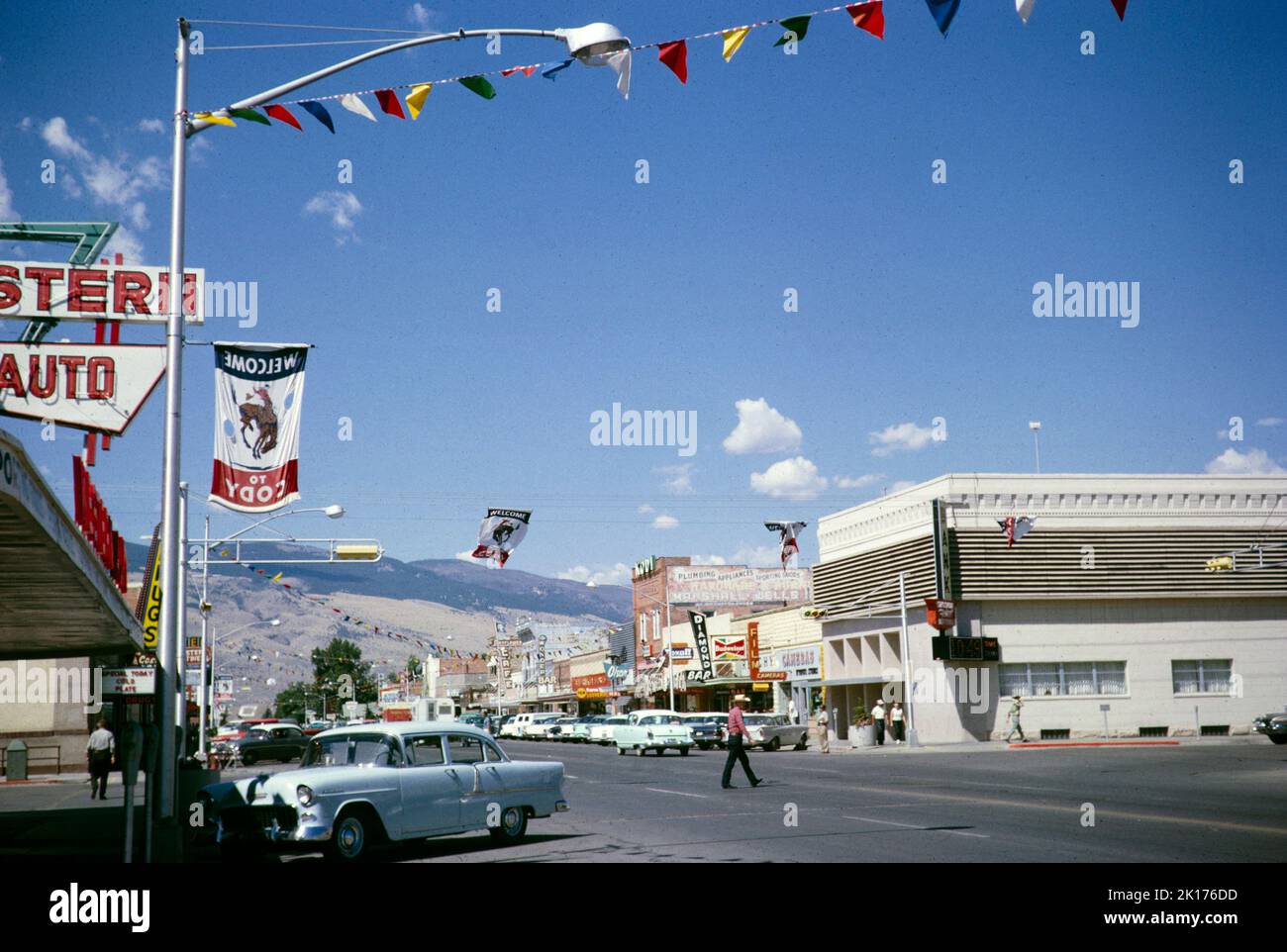 Street scene with cars and stores, Cody, Wyoming, USA 1963 Stock Photo