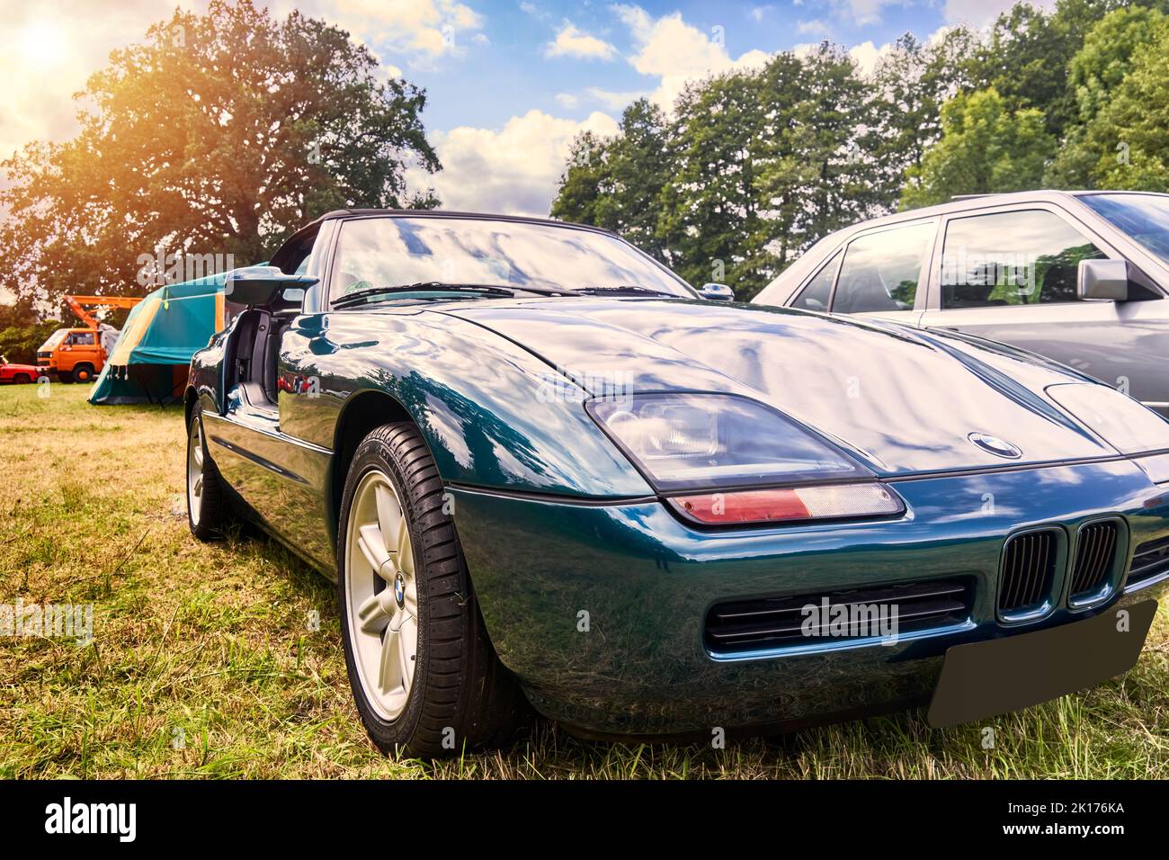 BMW Z1 sports car in oblique view, parked on a lawn with tents in the background, in Lehnin, Germany, September 11, 2022. Stock Photo