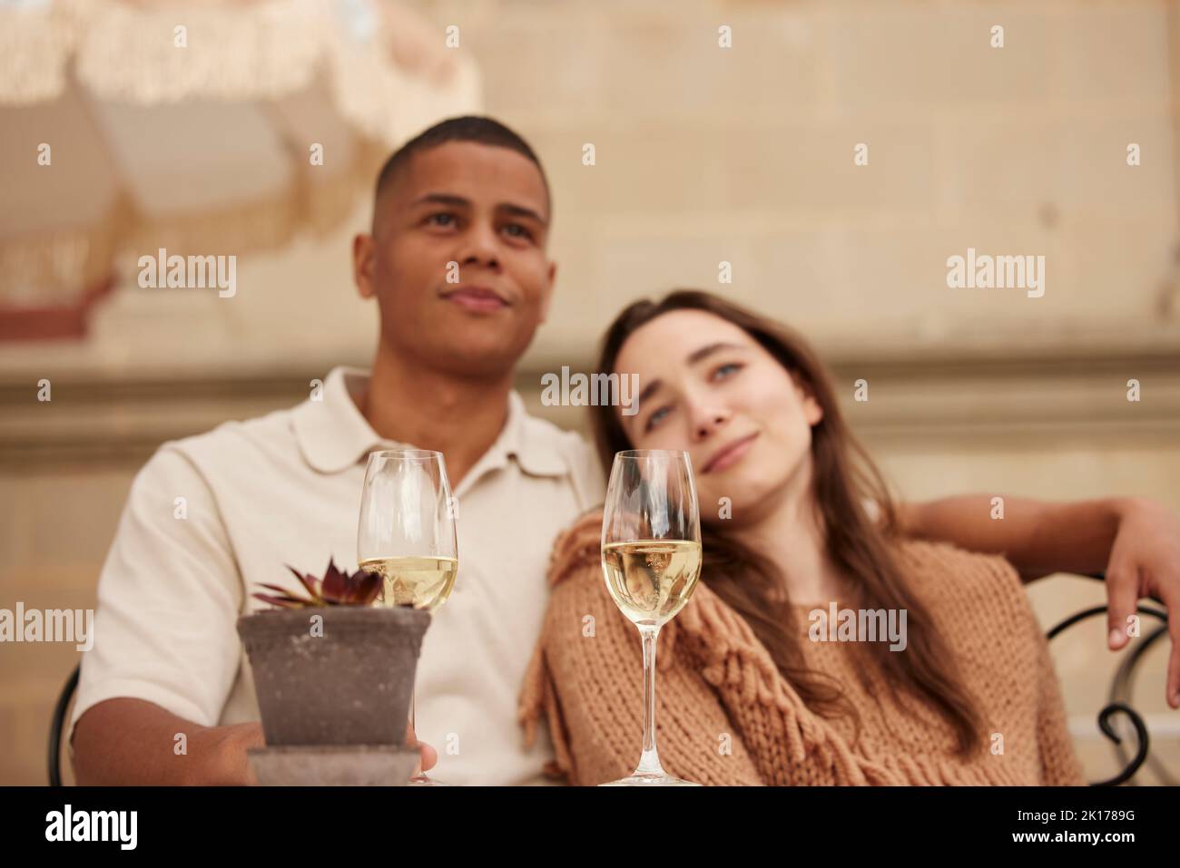 Couple celebrating on patio Stock Photo