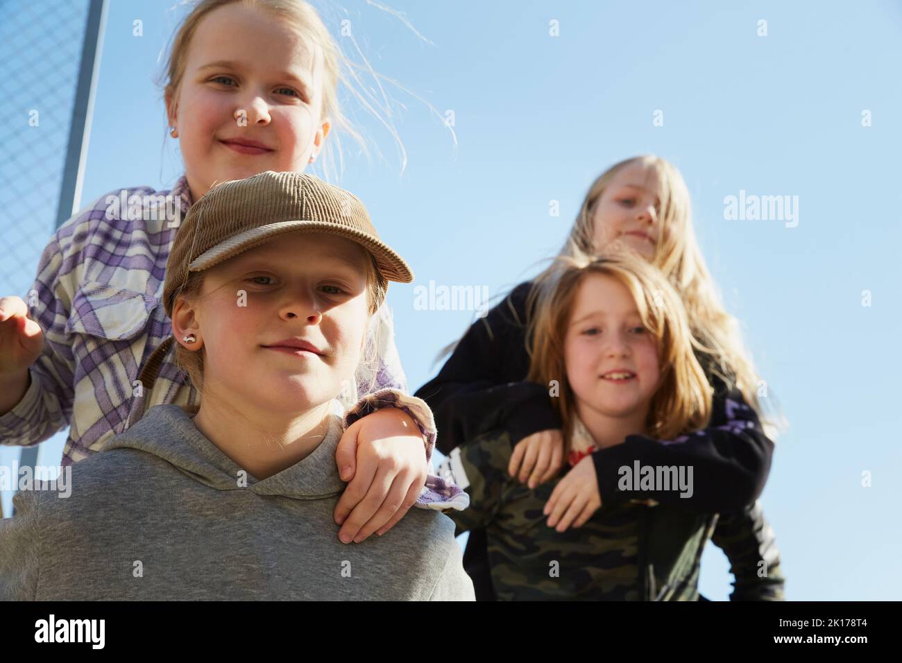 Children posing outside hi-res stock photography and images - Alamy