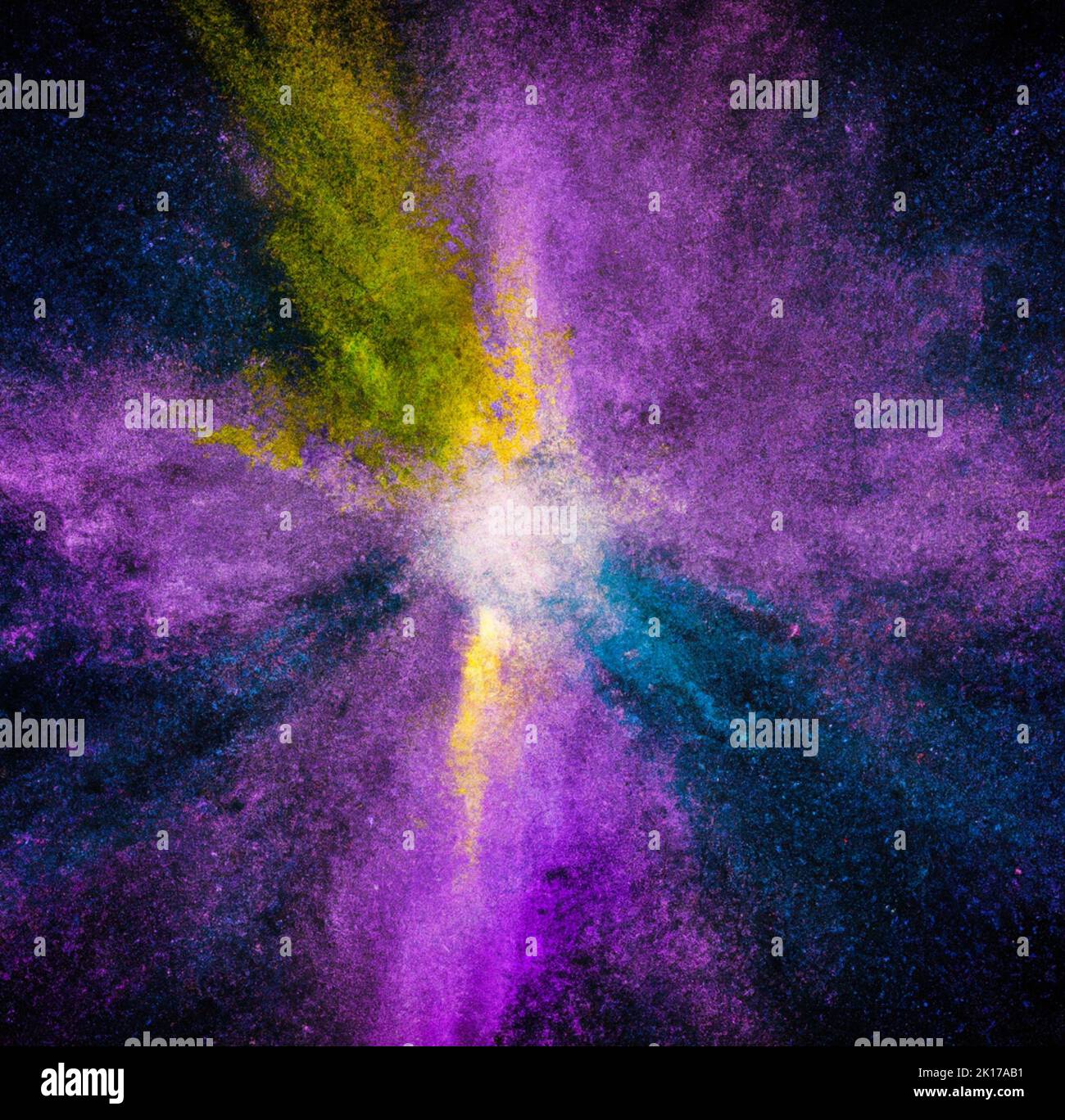 an Explosion of colored powder on a black background Stock Photo - Alamy