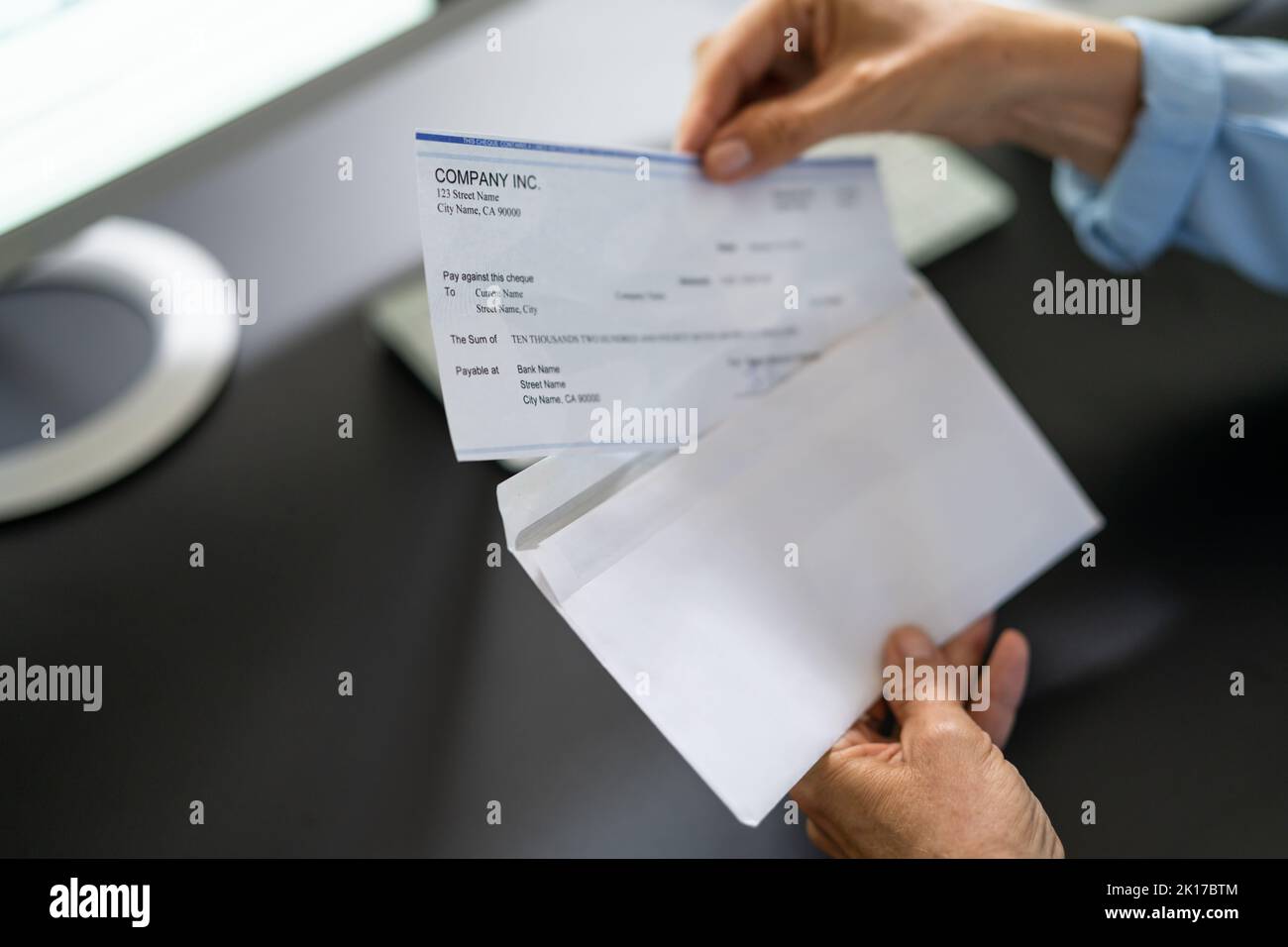 Payroll Cheque In Envelope. Woman Hand Holding Paycheck Stock Photo Alamy