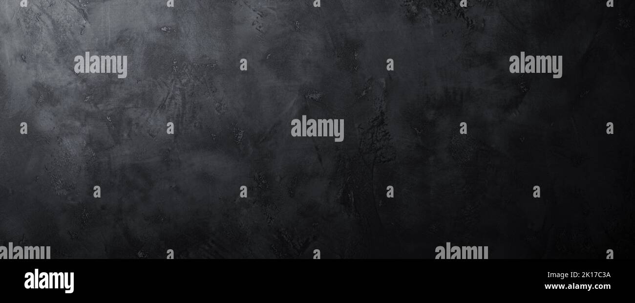 Black or dark gray rough stone or concrete wall texture background Stock Photo