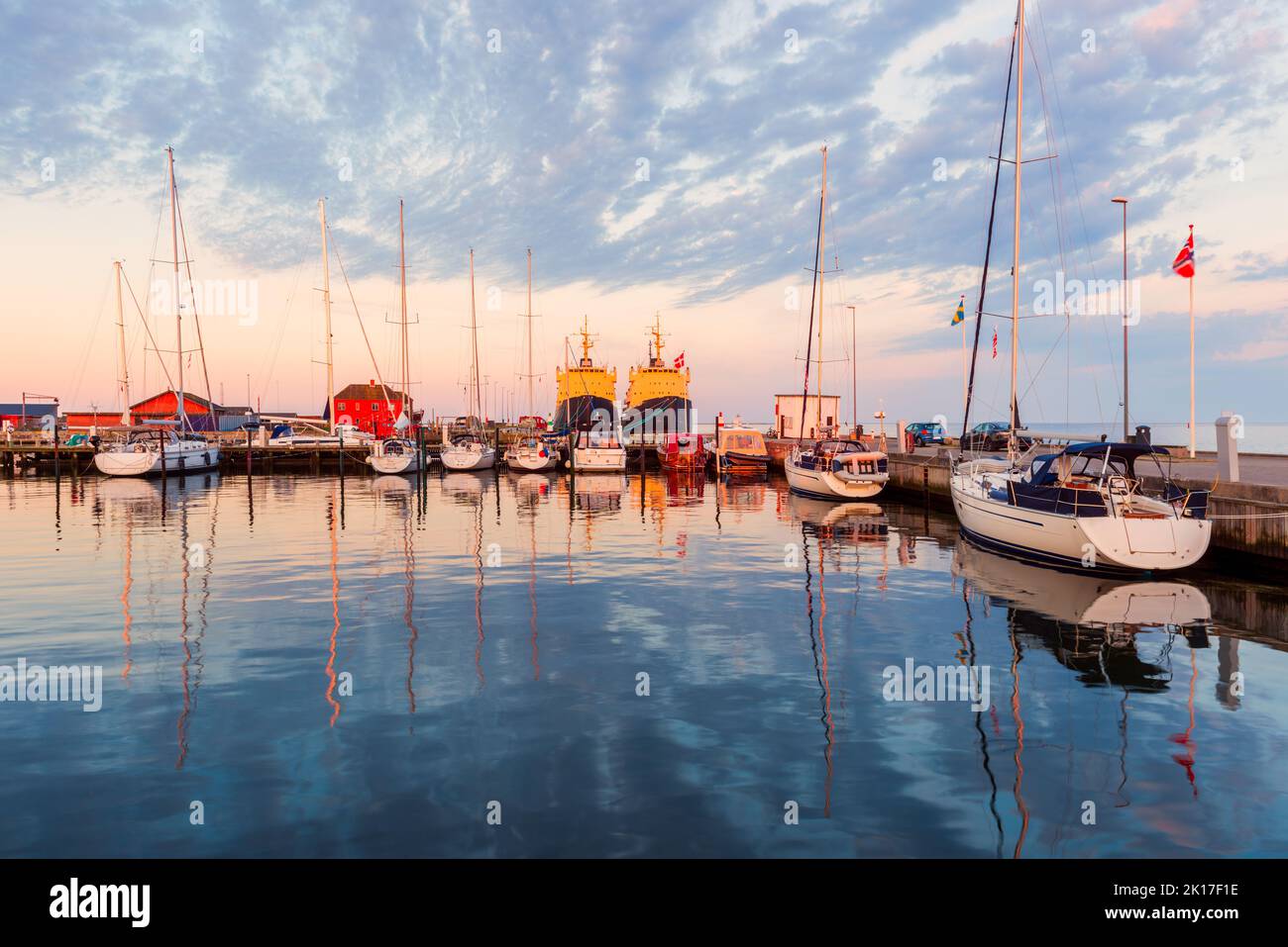 Small Harbor of Hals, Denmark around Sunset. Hals is a small town on the east coast of the Jutland peninsula in northern Denmark. Stock Photo