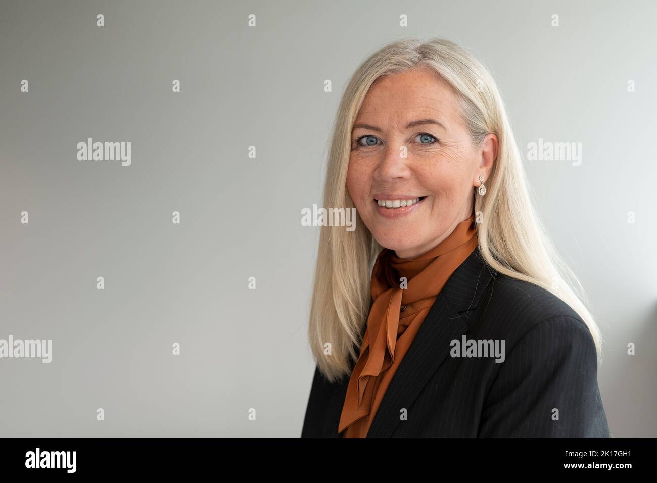 Portrait of businesswoman looking at camera Stock Photo