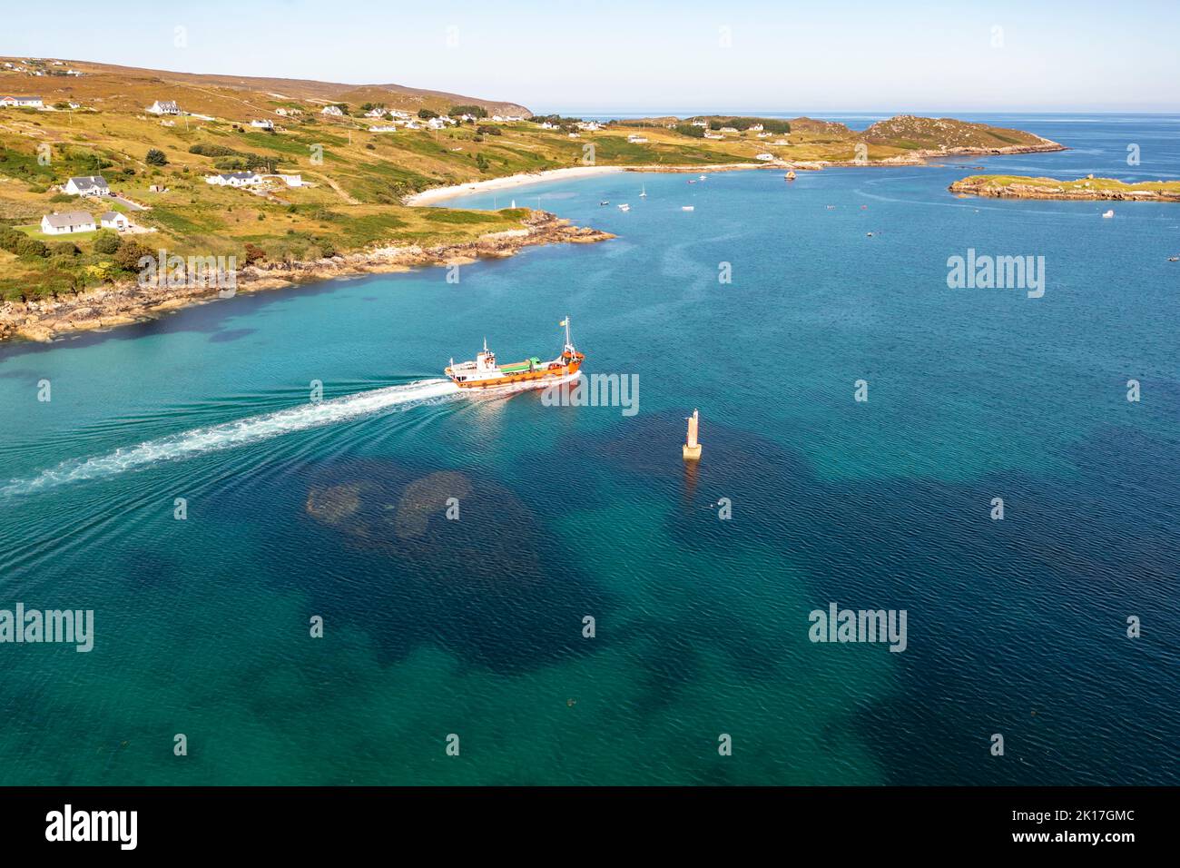 The red Arranmore ferry leaving the Island towards Burtonport, County Donegal, Ireland. Stock Photo