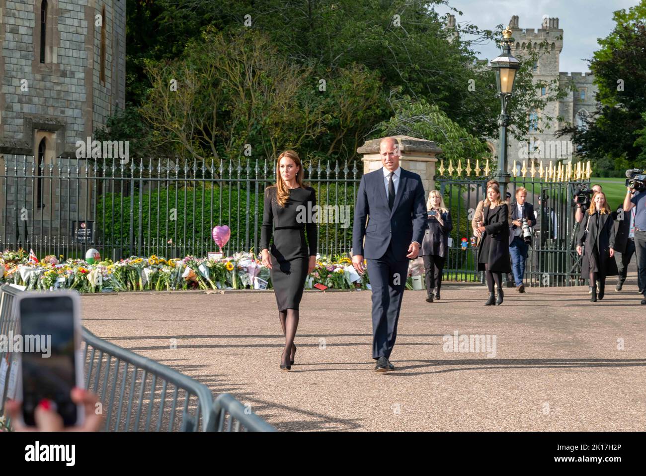 The Duke and Duchess of Sussex arrive with the Prince and Princess of Wales at Windsor Castle to greet well-wishers, during the second day of national Stock Photo