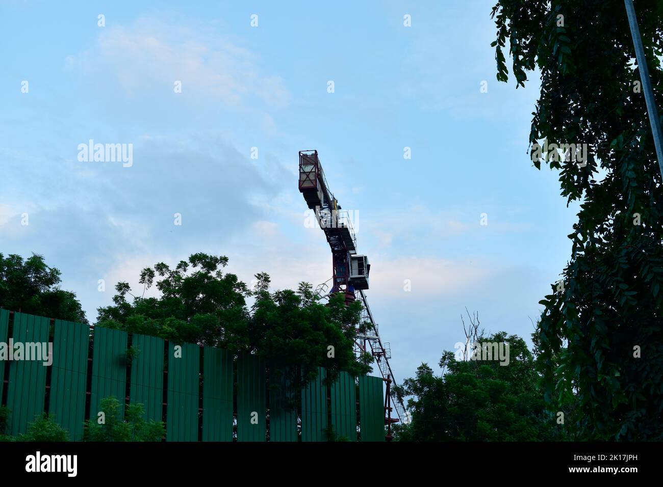 New Delhi, India - 14 September 2022 : Crane working at construction side Stock Photo