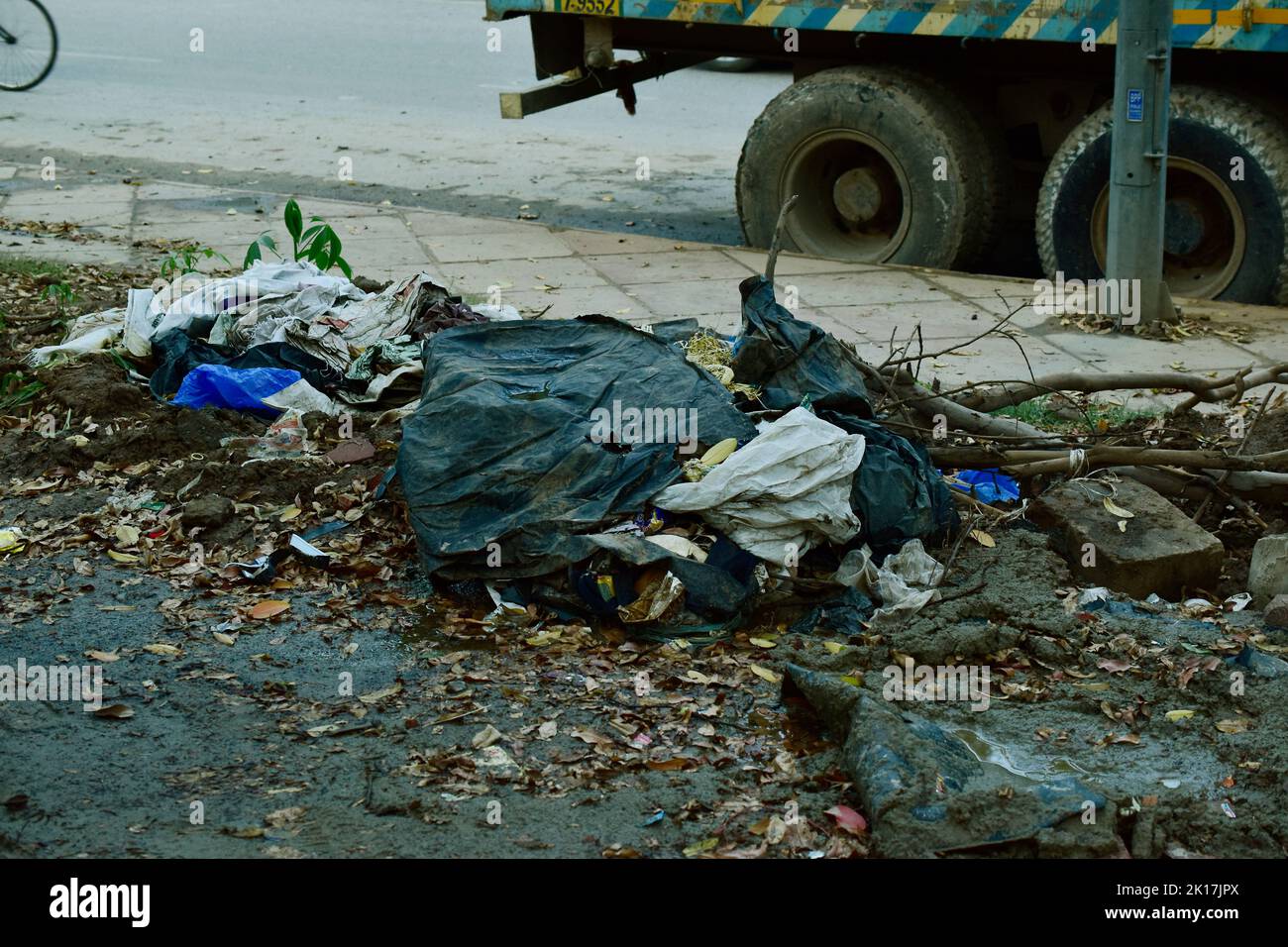 New Delhi, India - 14 September 2022 : Trash and plastic waste road side Stock Photo
