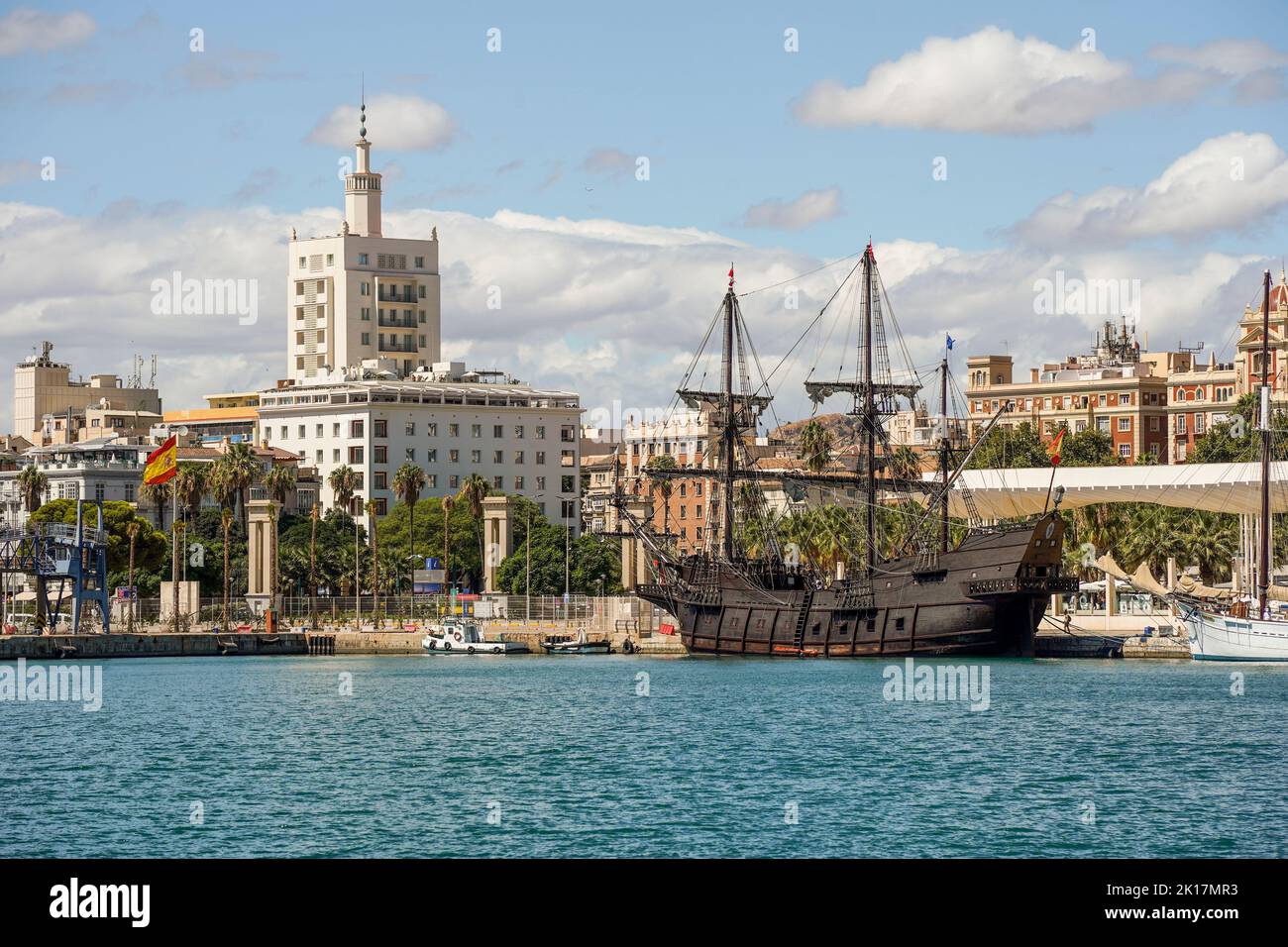 Three replicas of old sailing ships, Nao Victoria , Galeon Andalucia, Pascual Flores, moored in the port of Malaga, Andalucia, Spain. Stock Photo