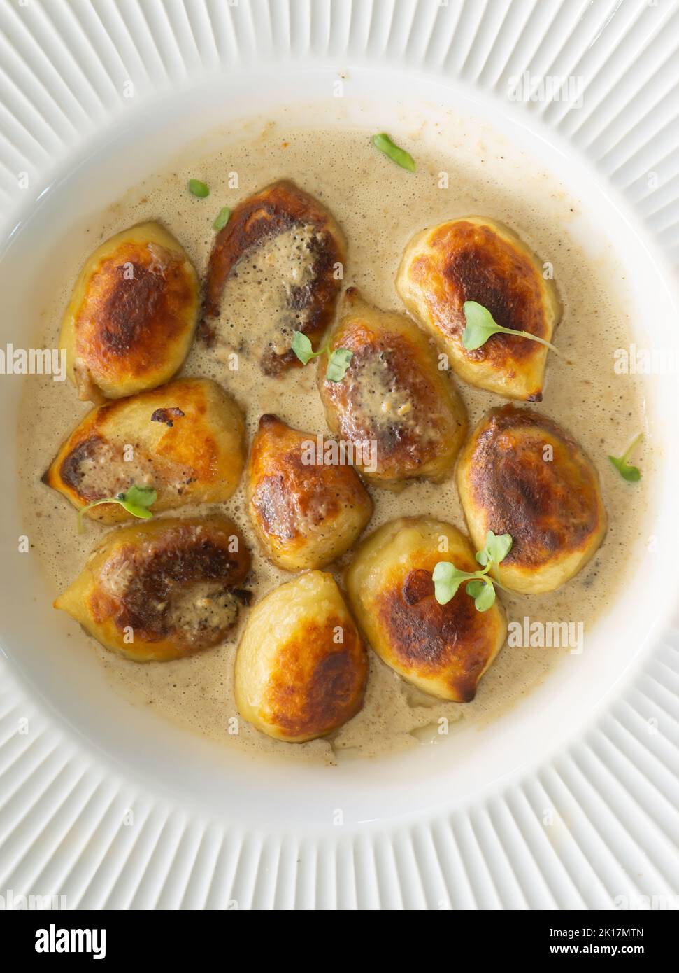 Crispy gnocchi stuffed with mushrooms(boletus edulis) with truffle