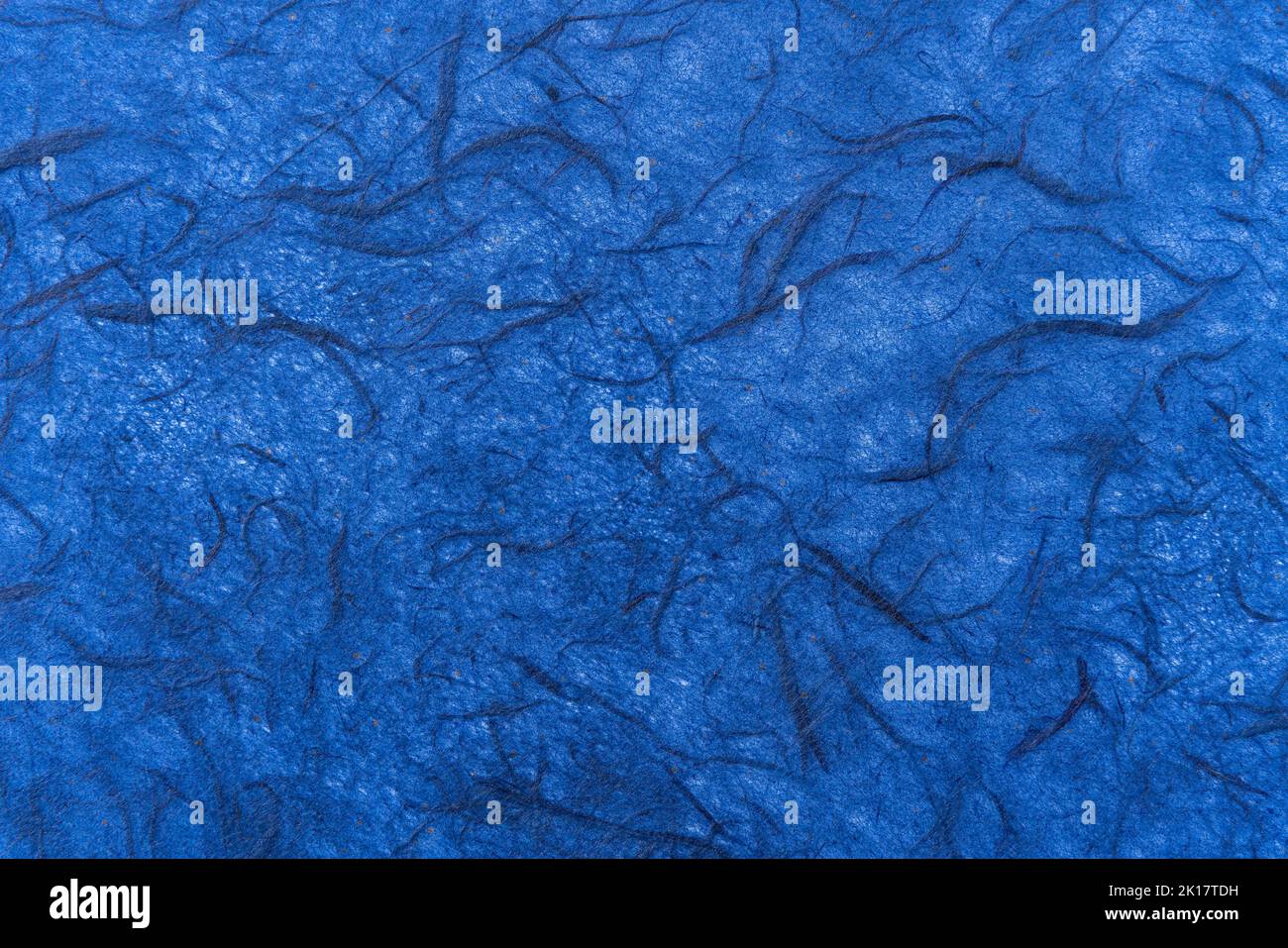 Straw paper texture background made from recycled sustainable biodegradable resources with a natural blue textured effect pattern, stock photo image Stock Photo