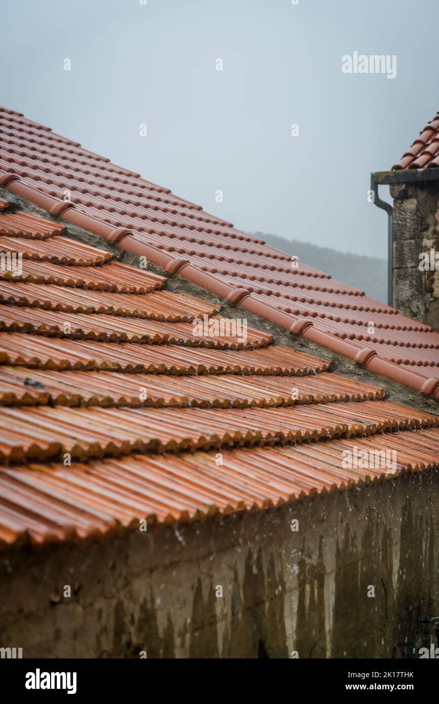 Rain dripping of the roof edge, Veli Iz, Island of Iz, Zadar archipelago, Dalmatia,, Croatia Stock Photo