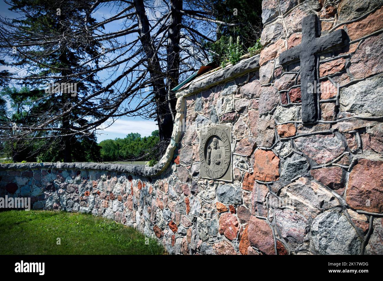 Part of an old wall, built with religious masonry, that stands in Saint Nazianz near Manitowoc, Wisconsin. Stock Photo