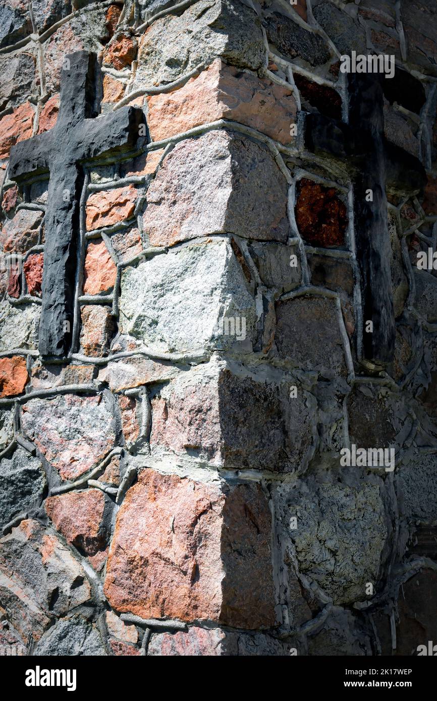 The corner of an old wall, built with religious masonry, that stands in Saint Nazianz near Manitowoc, Wisconsin. Stock Photo