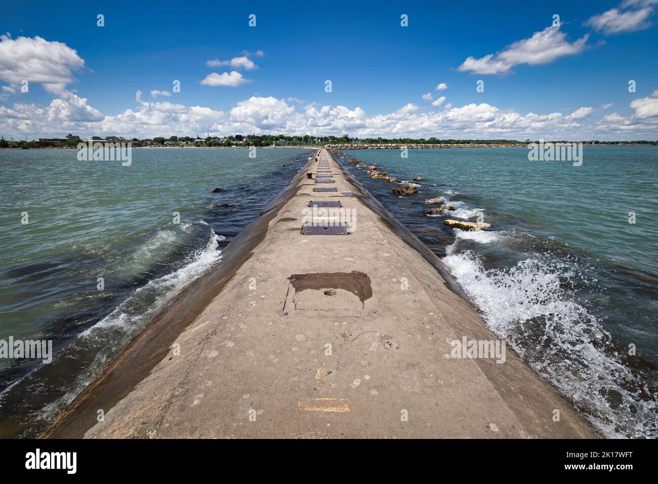 The north pier on Lake Michigan, looking back at north side of Manitowoc, Wisconsin. Stock Photo