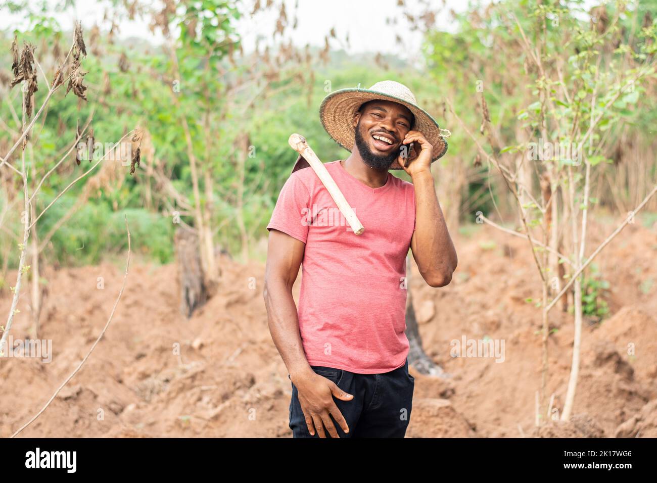 african farmer making a phone call Stock Photo