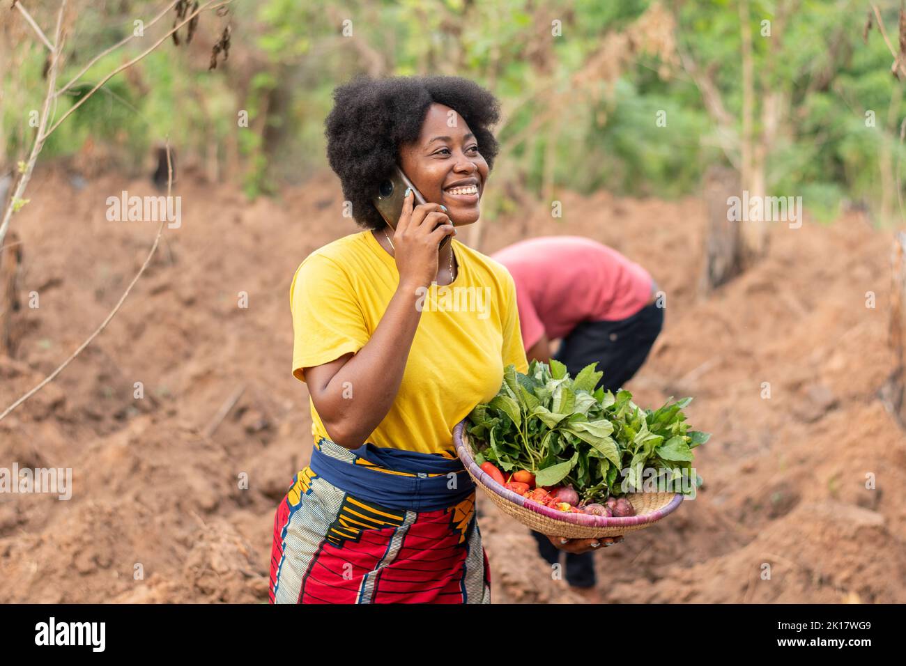 female african farmer making a phone call Stock Photo