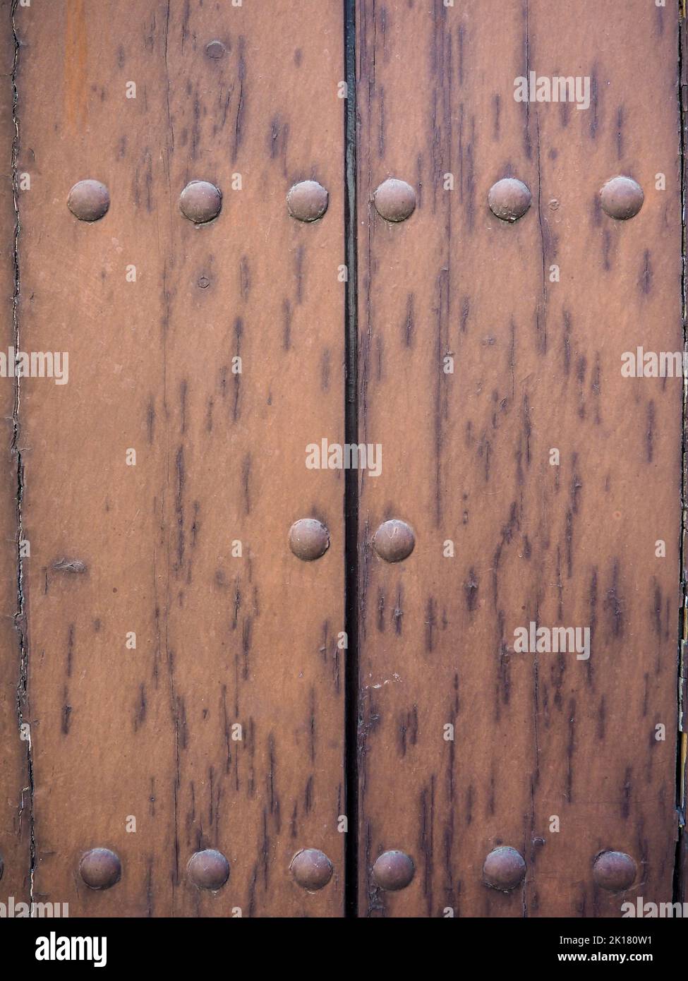 Details of old wooden door with rivets Stock Photo Alamy