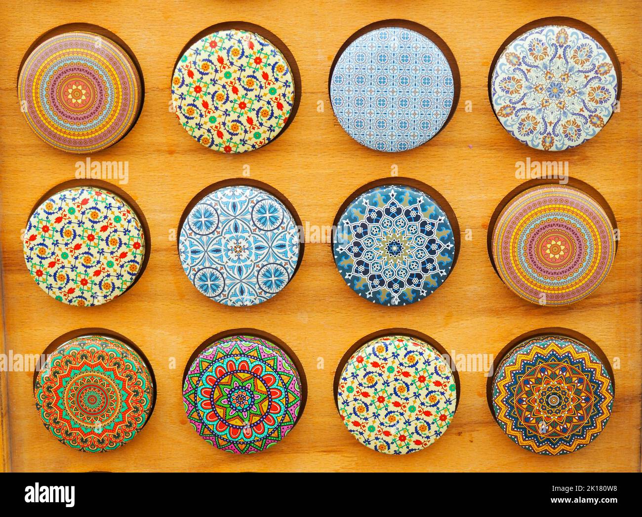 Small round boxes decorated in souvenir shops in Seville Stock Photo