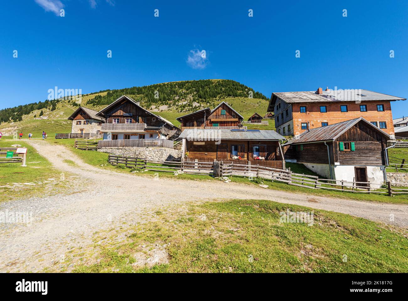 Small village in the Carnic Alps and the mountain peak of Osternig or Oisternig, Italy-Austria Border. Feistritz an der Gail, Carinthia, Austria. Stock Photo